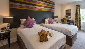 Premium bedding, desk, iron/ironing board, rollaway beds