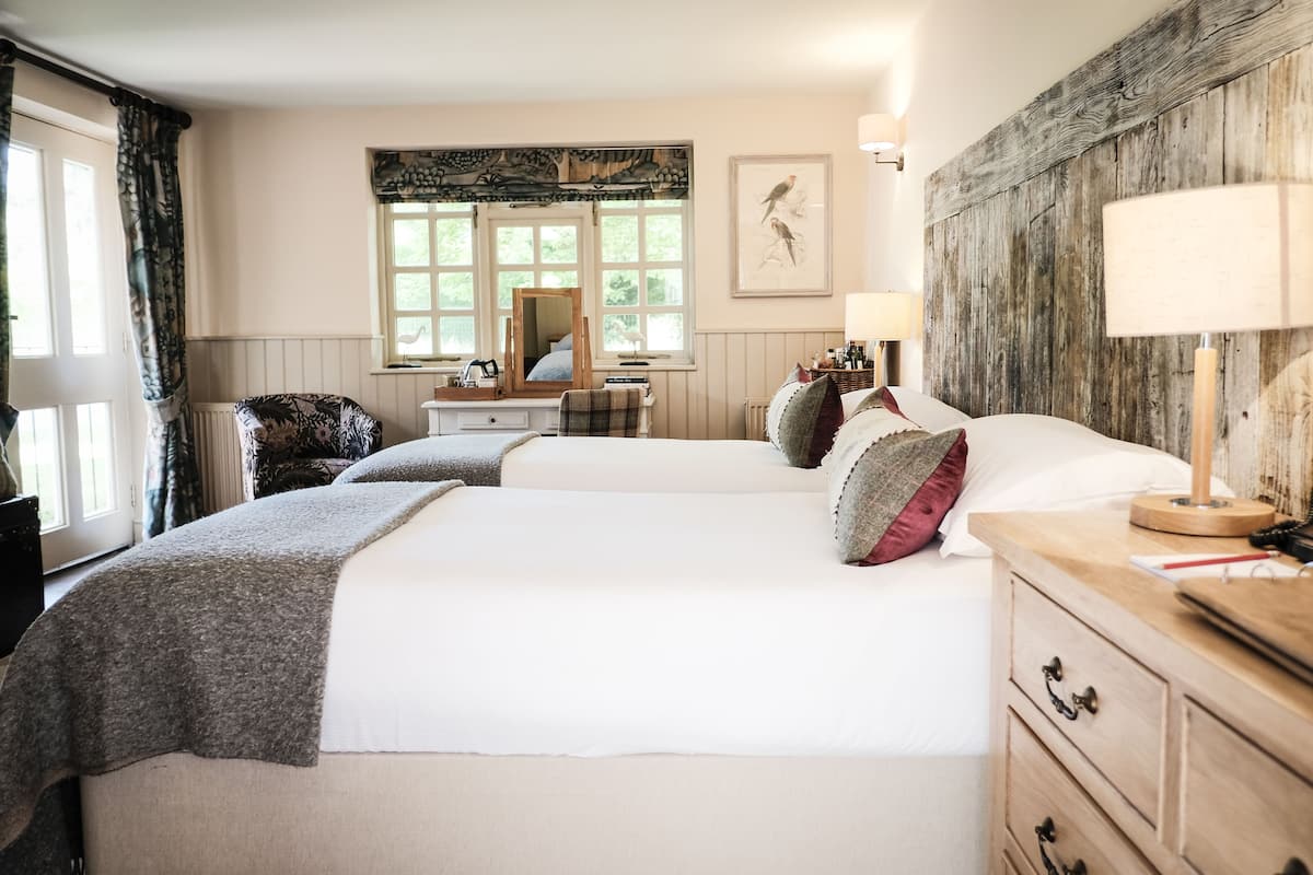 Accessible Comfy Room | Premium bedding, individually decorated, individually furnished, desk