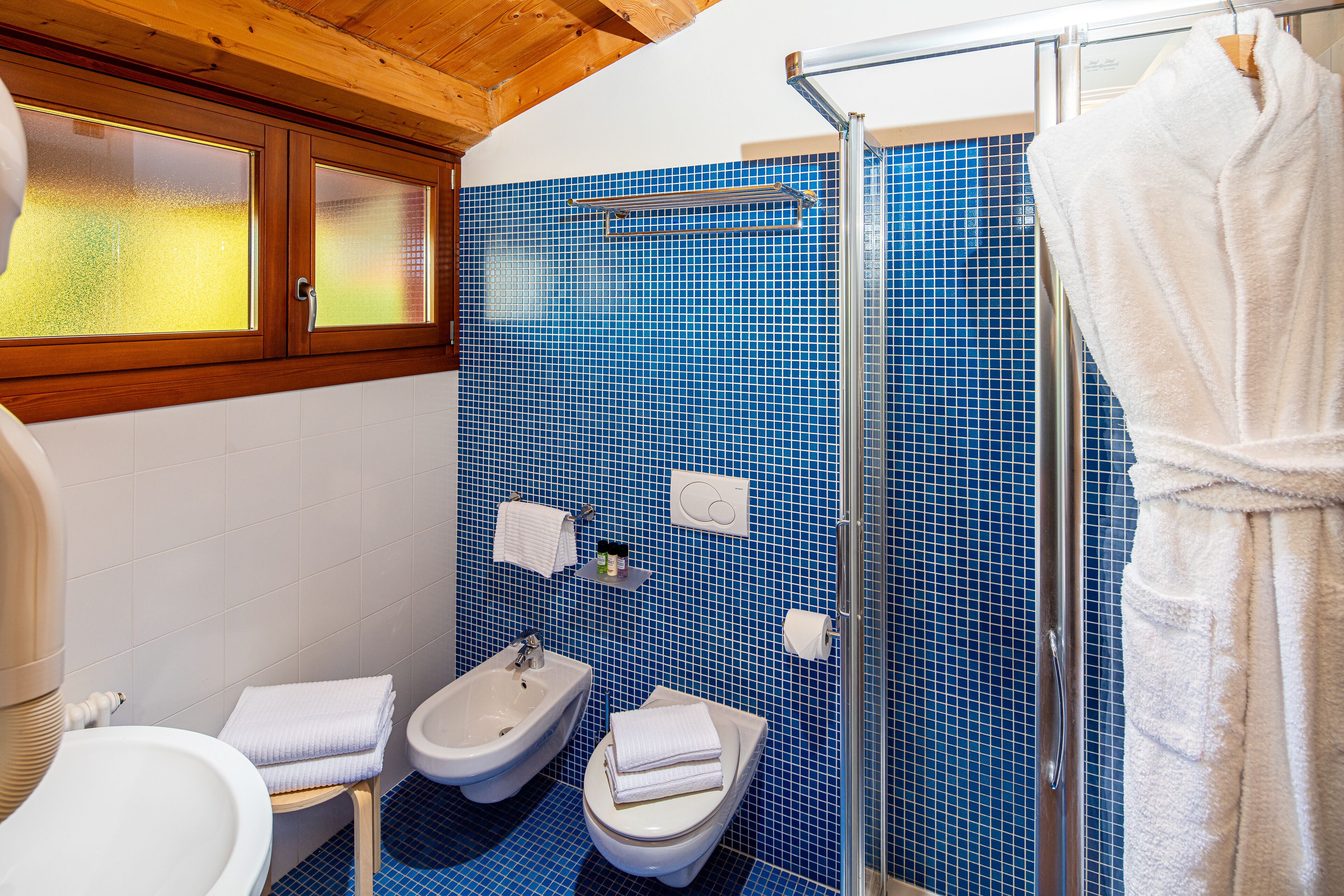 shower, free toiletries, hair dryer, bathrobes