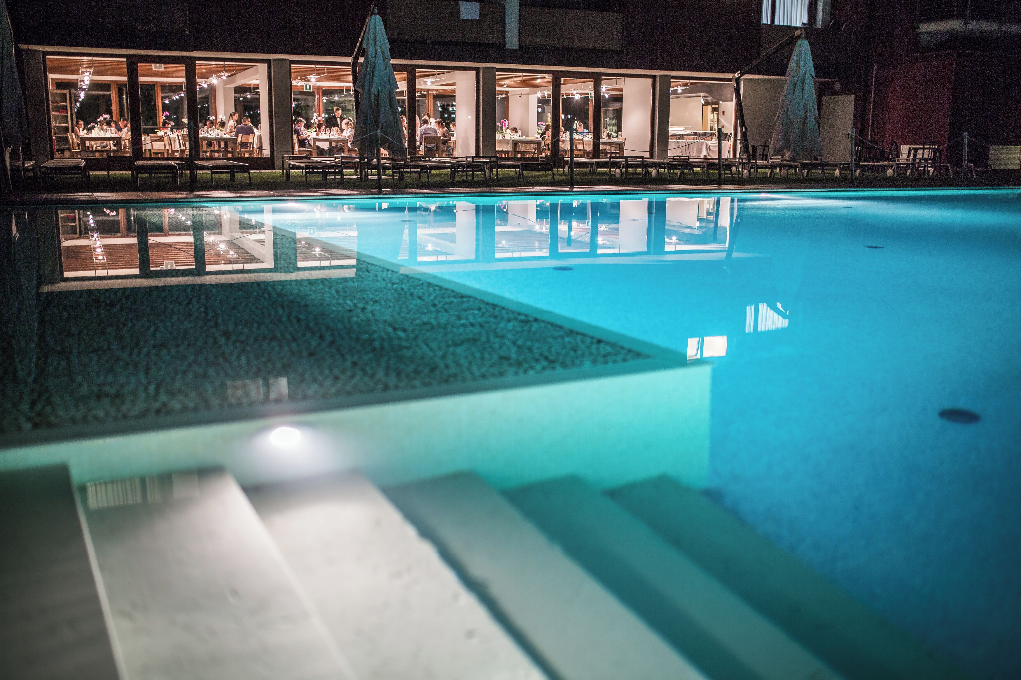 Seasonal outdoor pool, open 9:00 AM to 7:30 PM, pool umbrellas