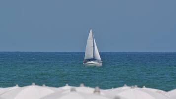 Beach nearby, white sand, free beach cabanas, sun loungers