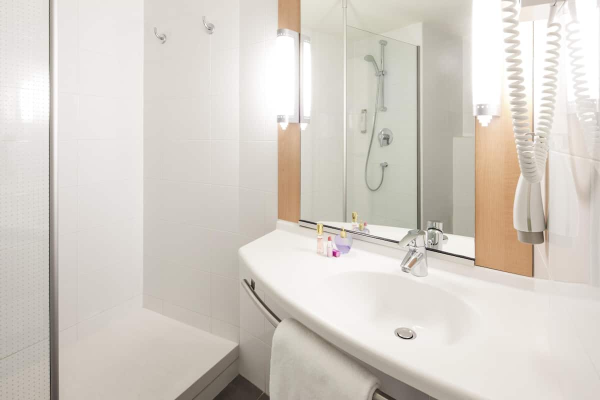 Desk, blackout drapes, soundproofing, iron/ironing board