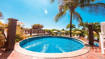 Outdoor pool, pool umbrellas, pool loungers