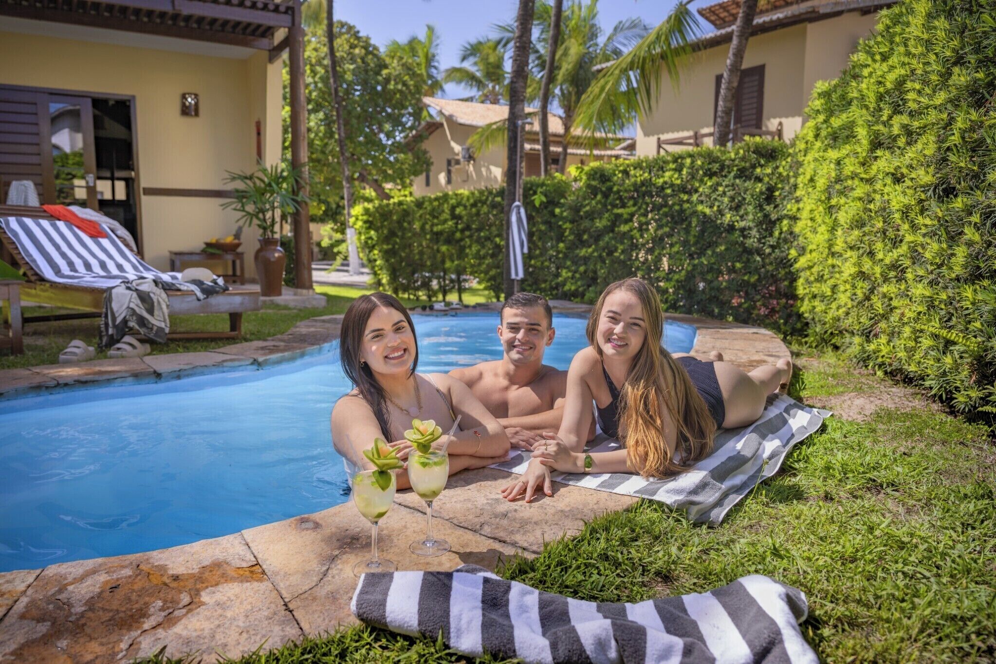 outdoor pool, pool umbrellas, pool loungers