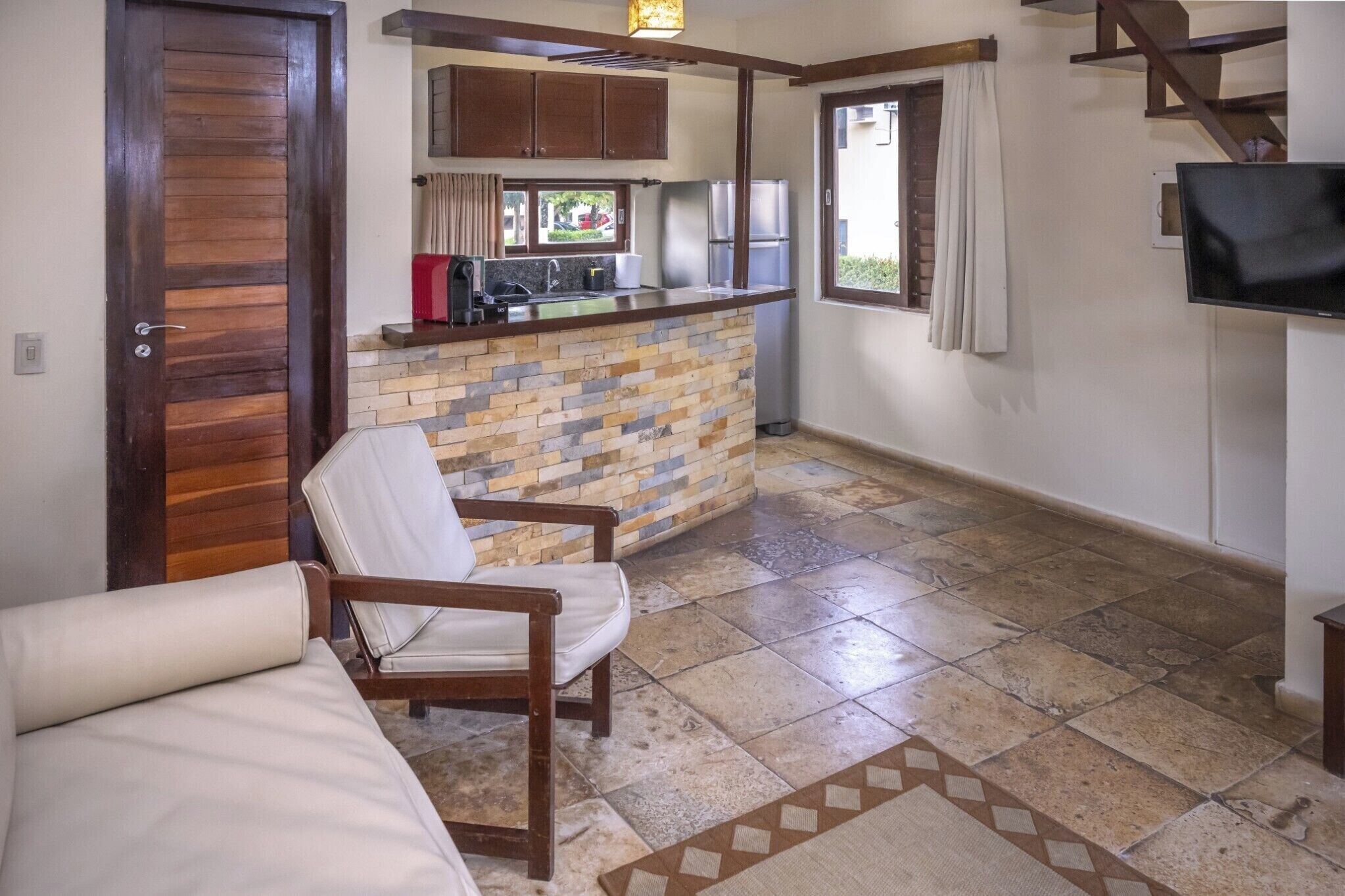 superior villa | living area | 32-inch tv with cable channels