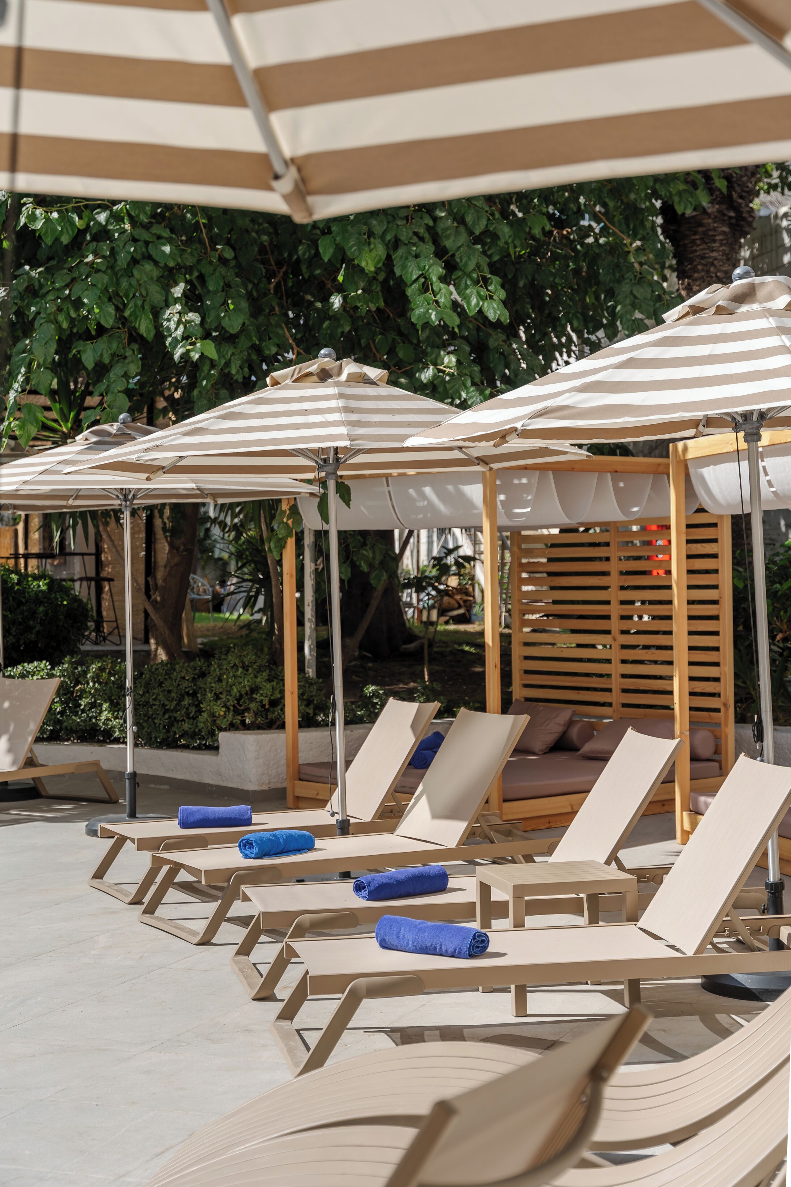 Seasonal outdoor pool, open 10 AM to 6 PM, pool umbrellas, sun loungers