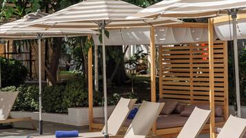 Seasonal outdoor pool, open 10 AM to 6 PM, pool umbrellas, sun loungers