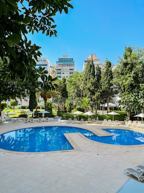 Seasonal outdoor pool, open 10 AM to 6 PM, pool umbrellas, sun loungers