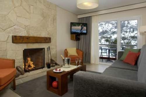 Apartment, 2 Bedrooms (7 guest) | Living area | 32-inch LCD TV with cable channels, TV, fireplace