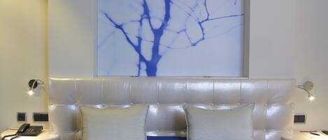 Premium bedding, down duvets, minibar, in-room safe