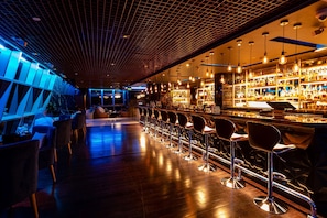 3 bars/lounges, swim-up bar, poolside bar, beach bar