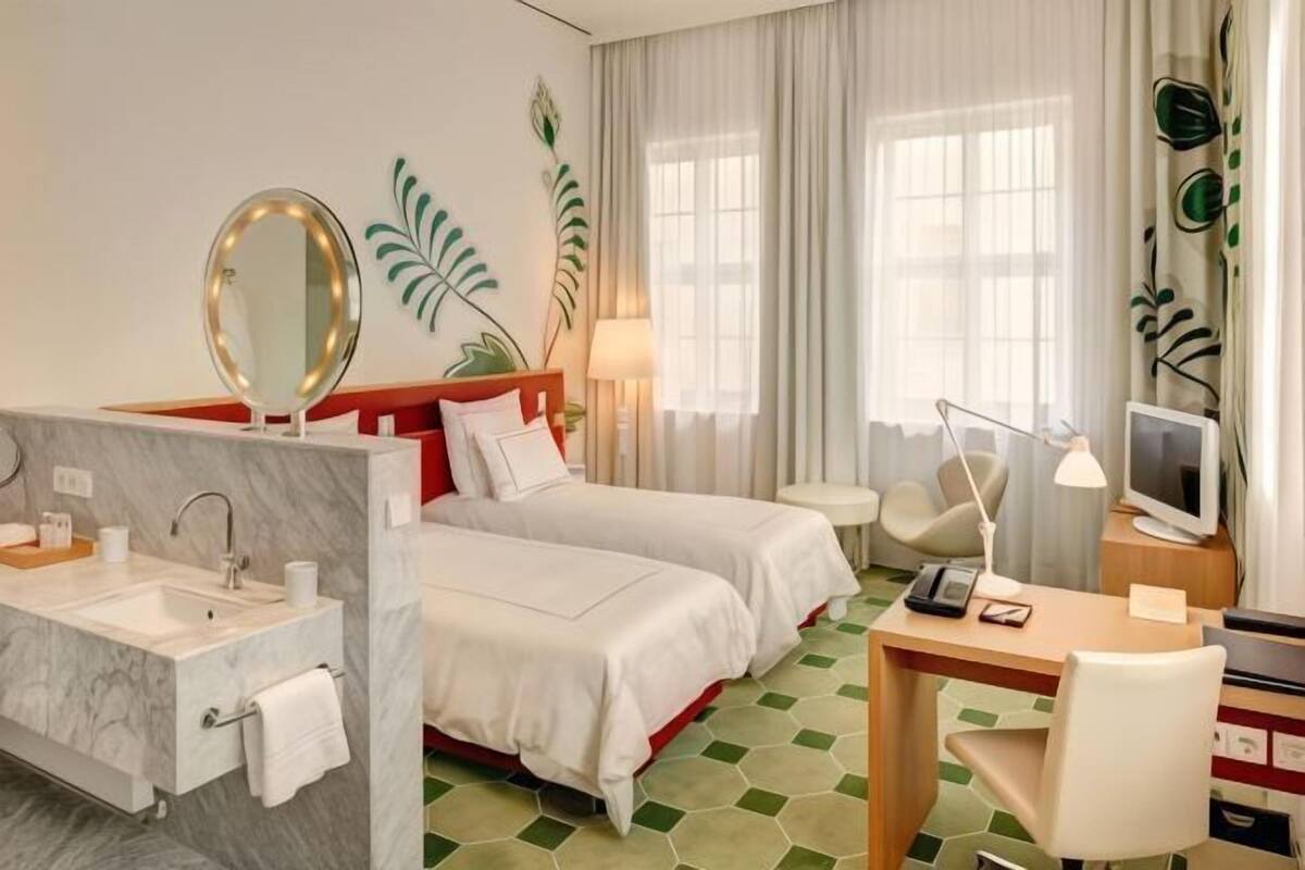 Hypoallergeen beddengoed, een gratis minibar, een kluis op de kamer