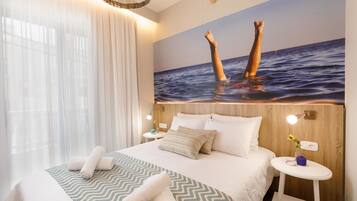 Apartemen Standar, 1 kamar tidur | Tirai kedap cahaya, Wi-Fi gratis, dan seprai linen