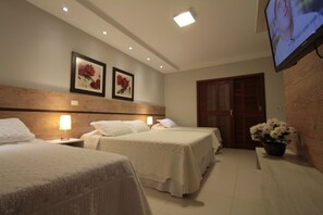 Habitación cuádruple Deluxe | 16 dormitorios y ropa de cama de alta calidad