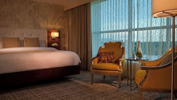 Premium bedding, down comforters, pillowtop beds, in-room safe