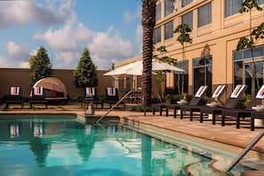 Outdoor pool, open 8:00 AM to 11:00 PM, pool umbrellas, sun loungers