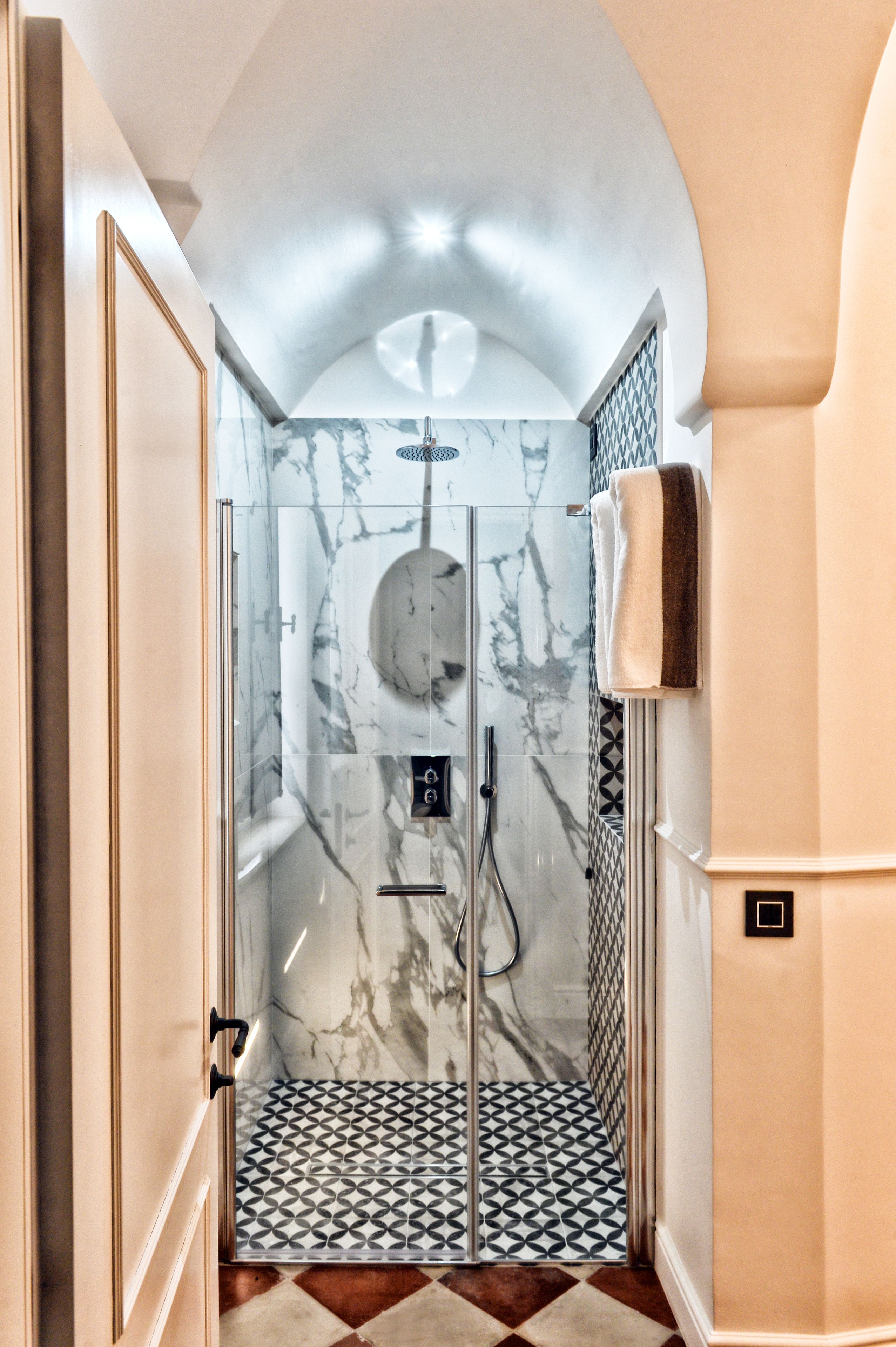 deluxe double room single use, 1 king bed | bathroom | shower, rainfall showerhead, free toiletries, hair dryer