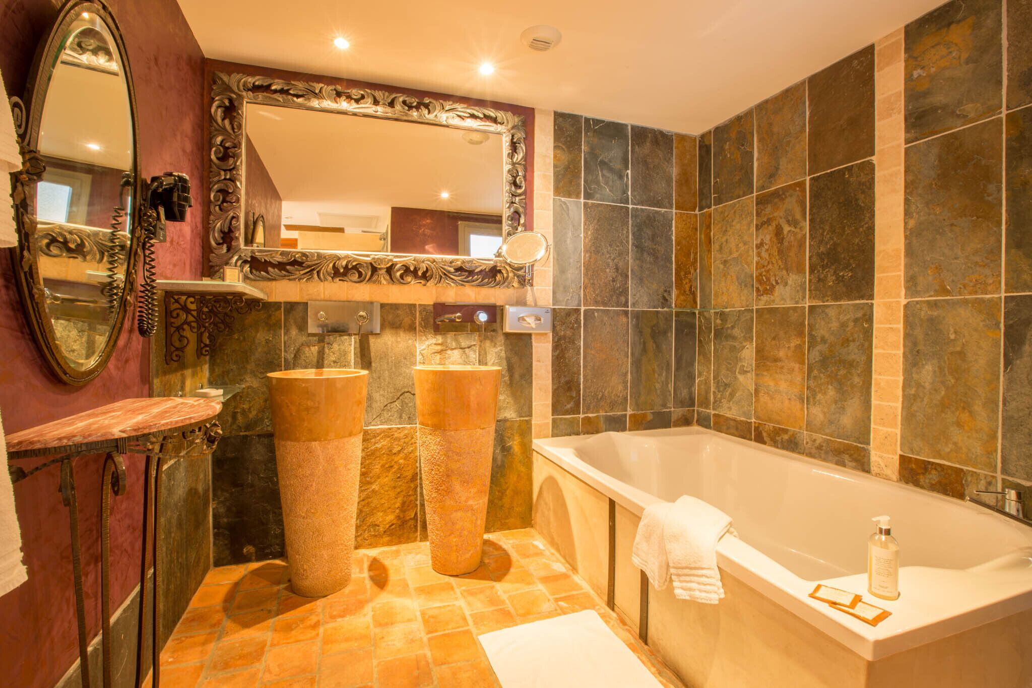 romantic suite (gourdon) | bathroom | hair dryer, towels