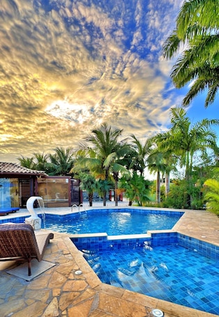 Outdoor pool, pool umbrellas, sun loungers