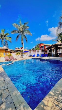 Outdoor pool, pool umbrellas, sun loungers