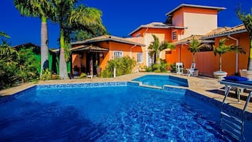 Outdoor pool, pool umbrellas, pool loungers