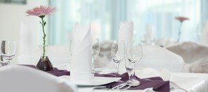 Enjoy a stylish meal in the comfort of your room, with a beautifully set table and elegant tableware.