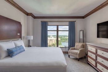 Premium bedding, pillowtop beds, in-room safe, desk at Wyndham Grand Orlando Resort Bonnet Creek
