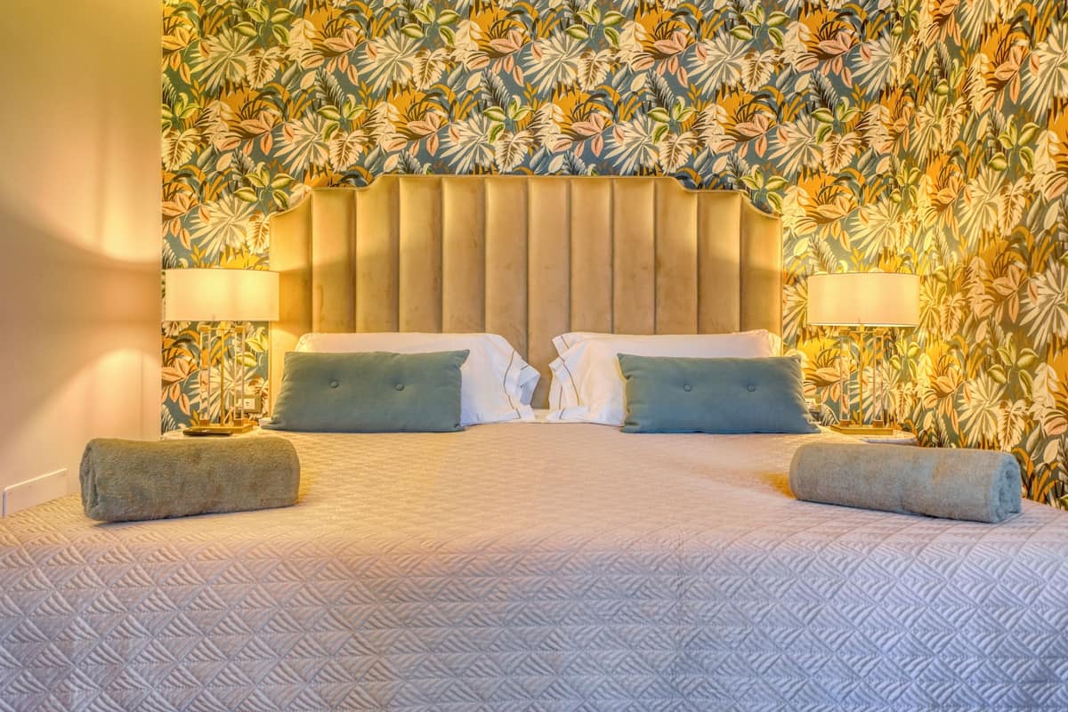 family suite, 2 bedrooms, lake view | 1 bedroom, down duvets, memory-foam beds, minibar