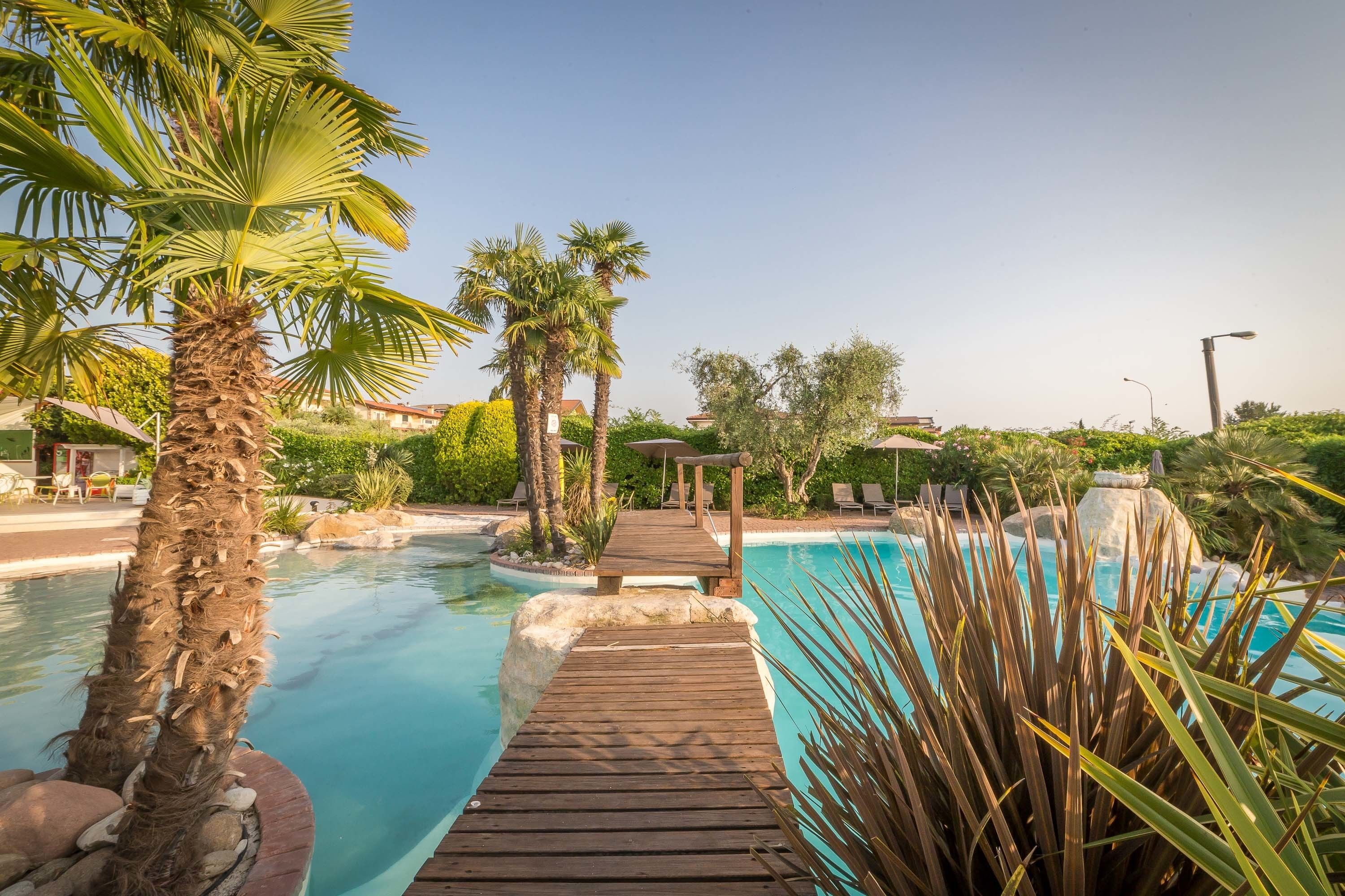 3 outdoor pools, pool umbrellas, pool loungers