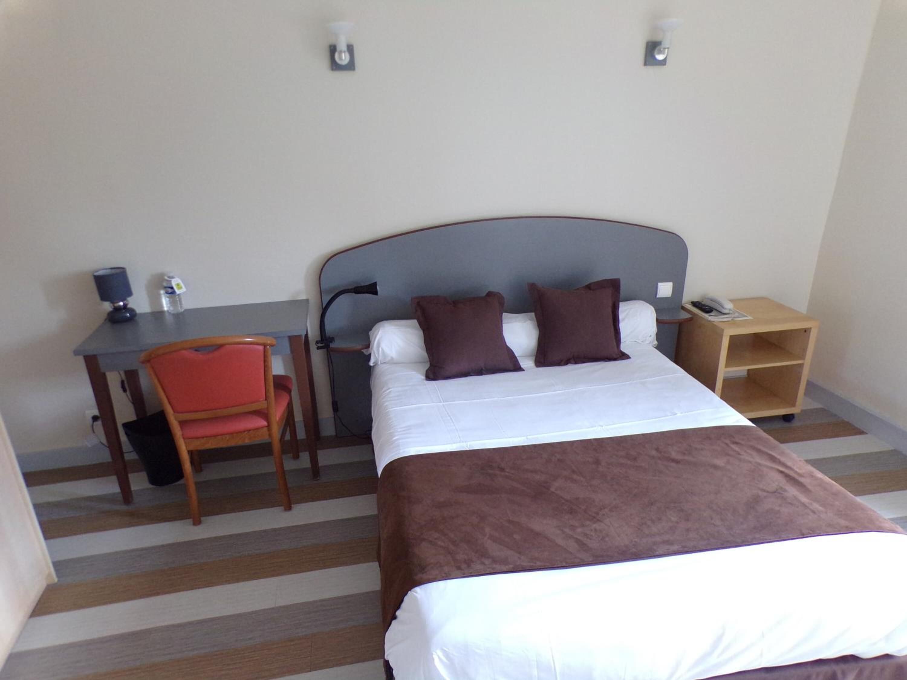 desk, blackout curtains, soundproofing, iron/ironing board