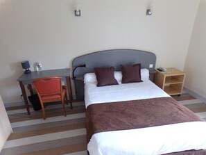 Desk, blackout curtains, soundproofing, iron/ironing board