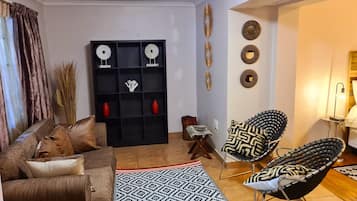 Family Suite | Living area | 32-inch Smart TV with digital channels