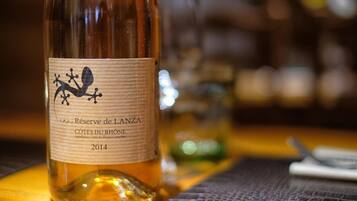 A bottle of wine with a label that includes the text "Reserve de Lanza" and "Côtes du Rhône 2014".