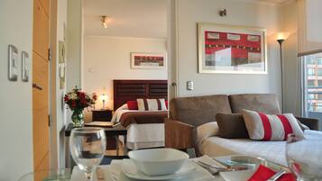 Apartment, 1 Queen Bed with Sofa bed | Living area | 26-inch LCD TV with cable channels, TV