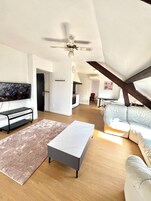 Family Apartment, Multiple Beds | Living area | LCD TV