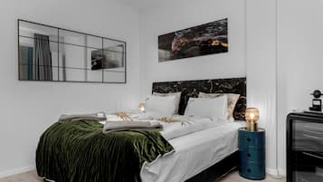 Premium bedding, down duvets, pillow-top beds, individually decorated