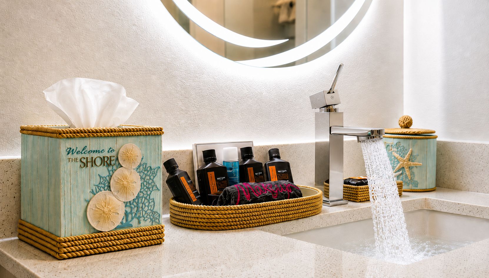 A bathroom vanity with a towel dispenser, a soap dish, and a bottle of shampoo.
