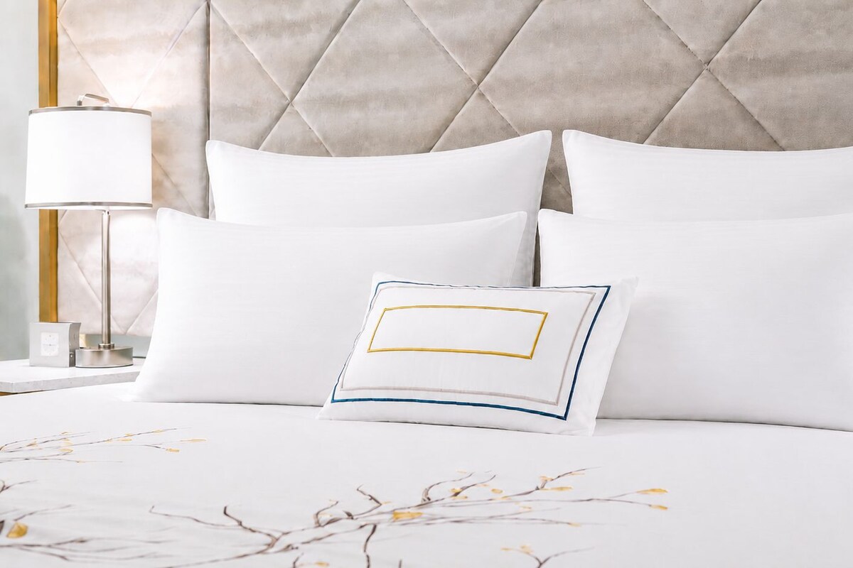 Frette Italian sheets, premium bedding, Tempur-Pedic beds, minibar