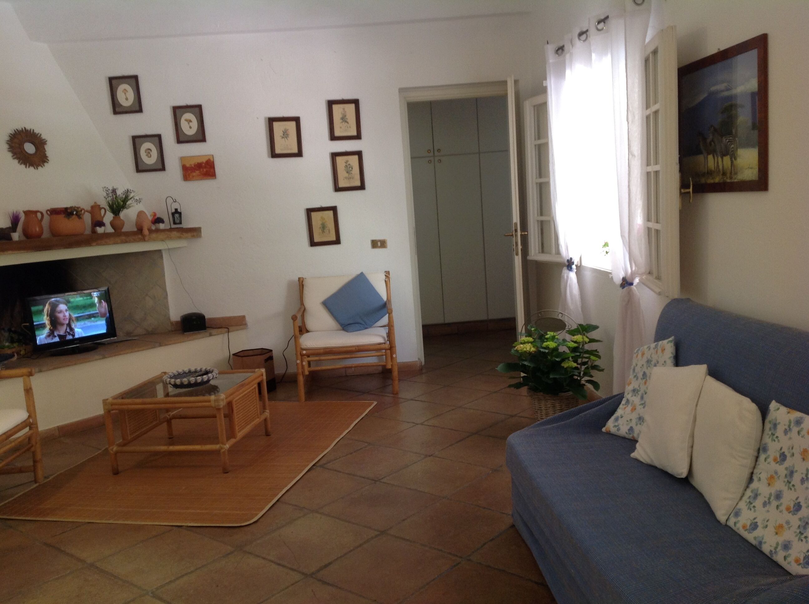 family villa, partial sea view | living area | tv