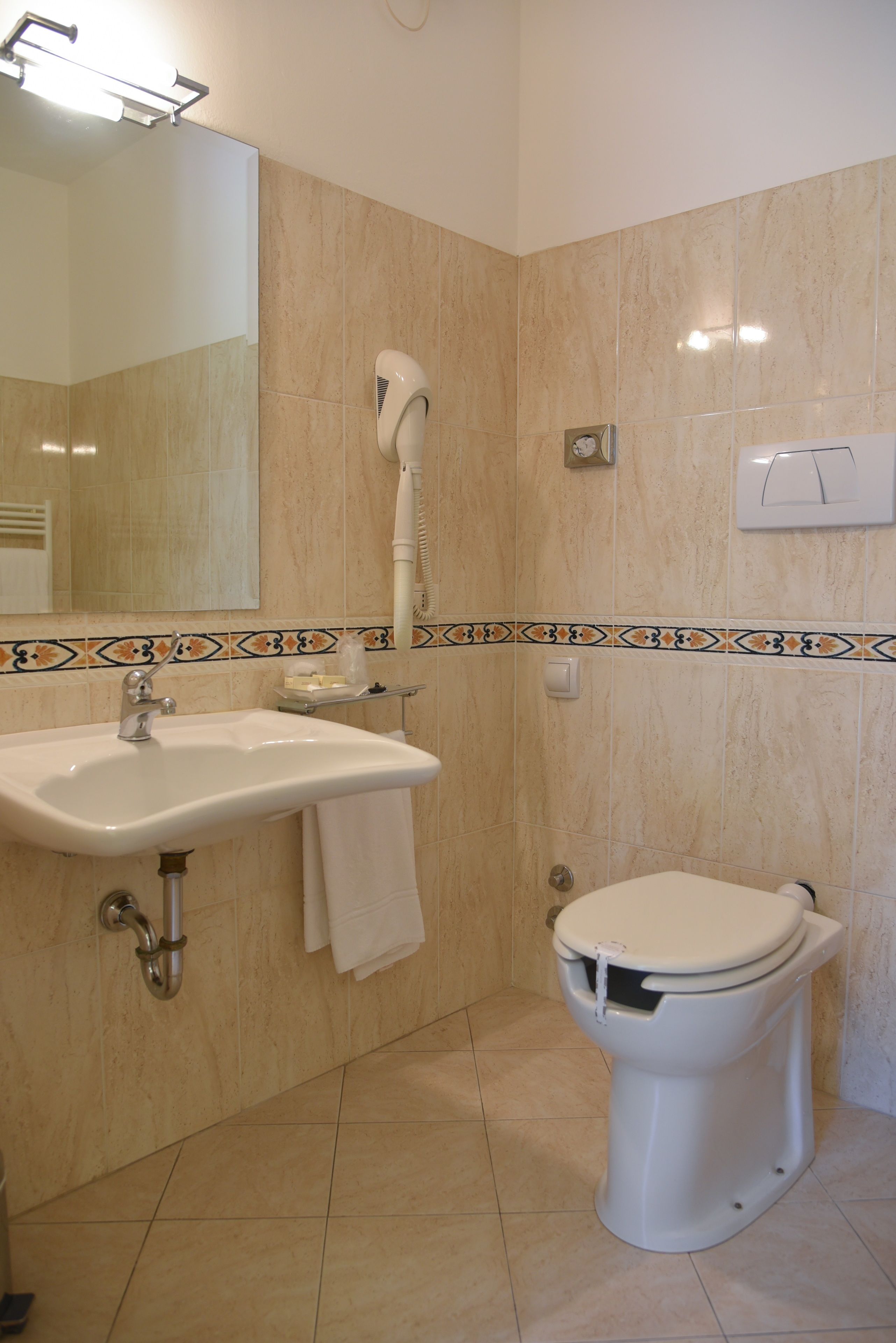 standard double room (non smoking room) | bathroom | free toiletries, hair dryer, bidet, towels