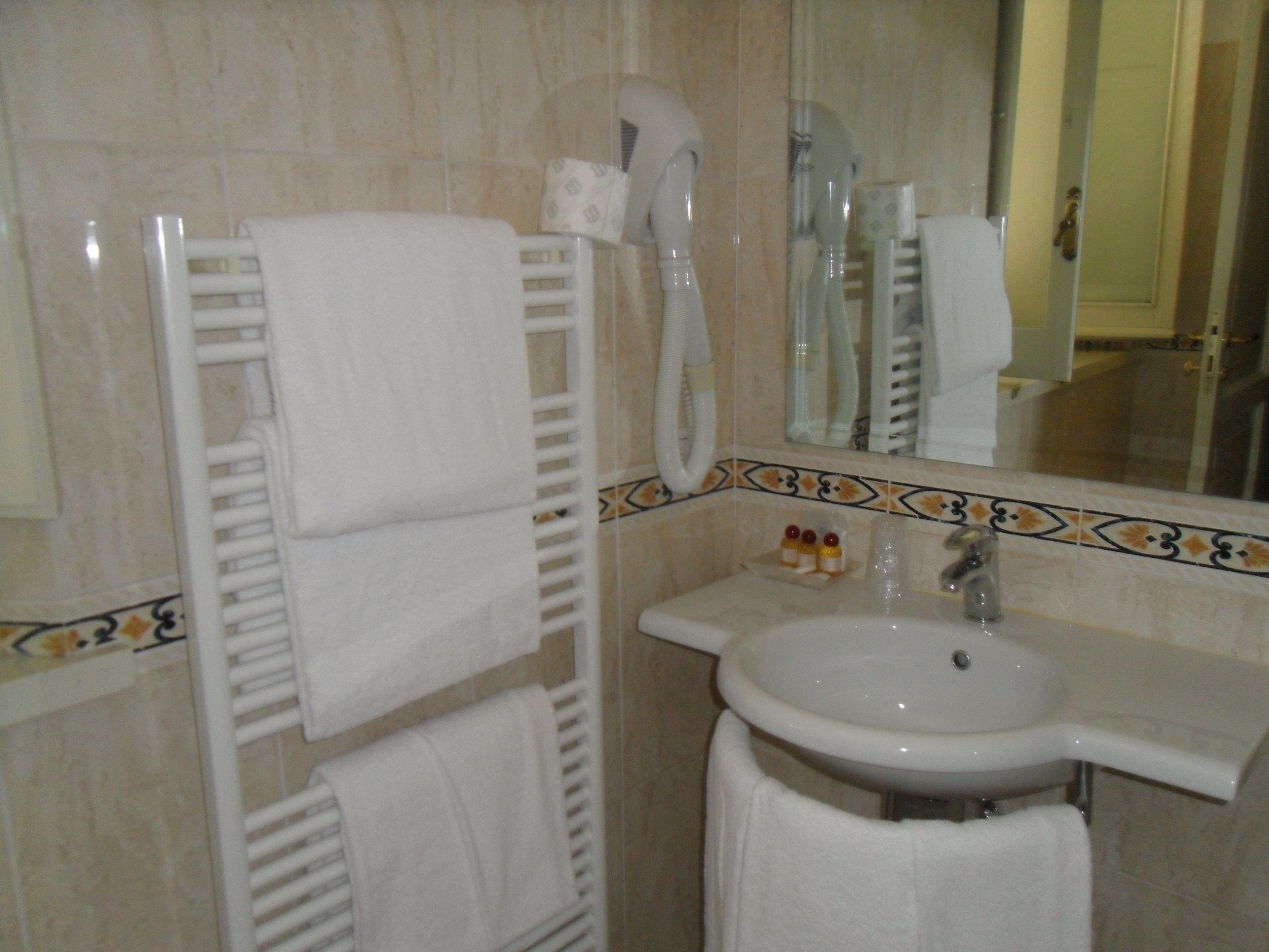 free toiletries, hair dryer, bidet, towels