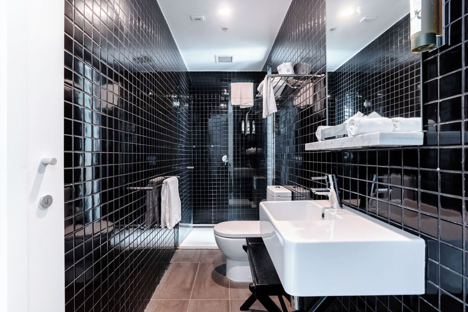 deluxe queen room | bathroom | designer toiletries, hair dryer, towels