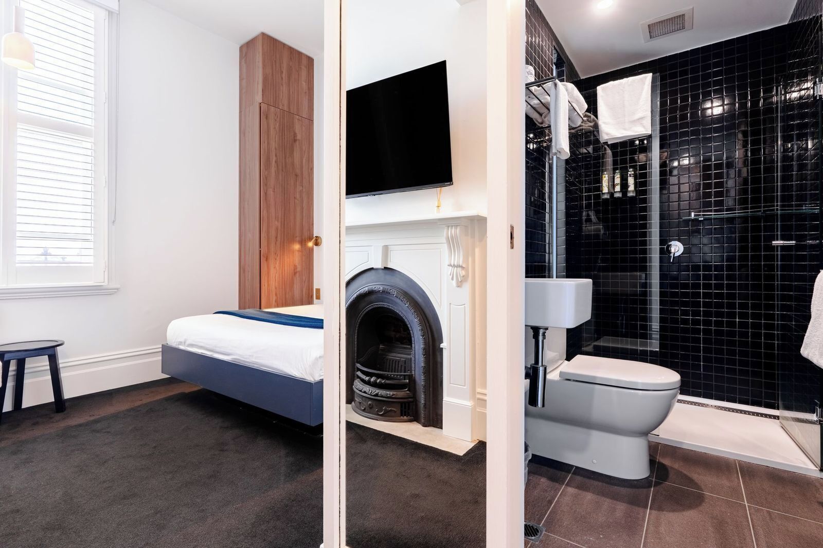 standard queen room | bathroom | designer toiletries, hair dryer, towels