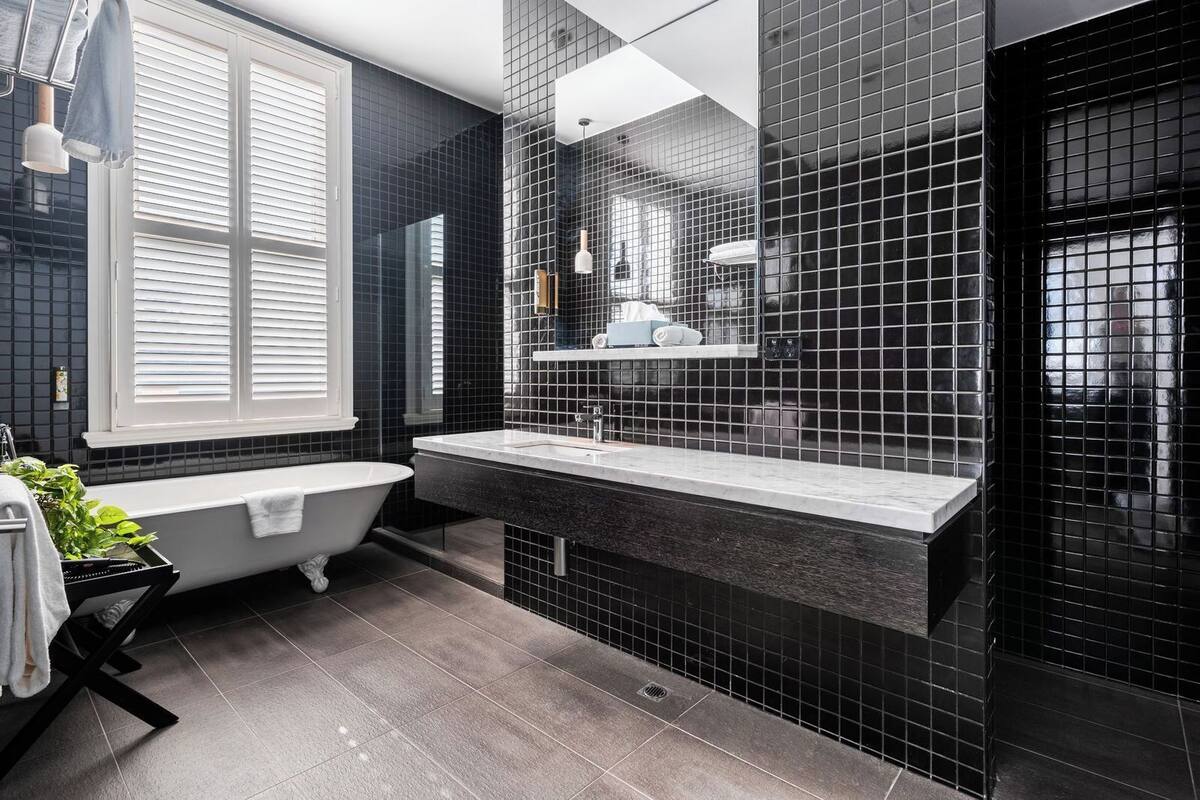 king apartment | bathroom | designer toiletries, hair dryer, towels