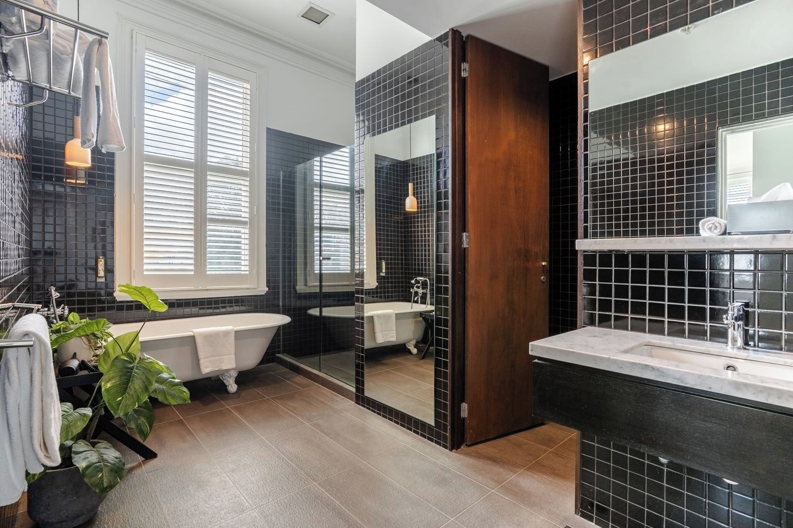 king suite | bathroom | designer toiletries, hair dryer, towels