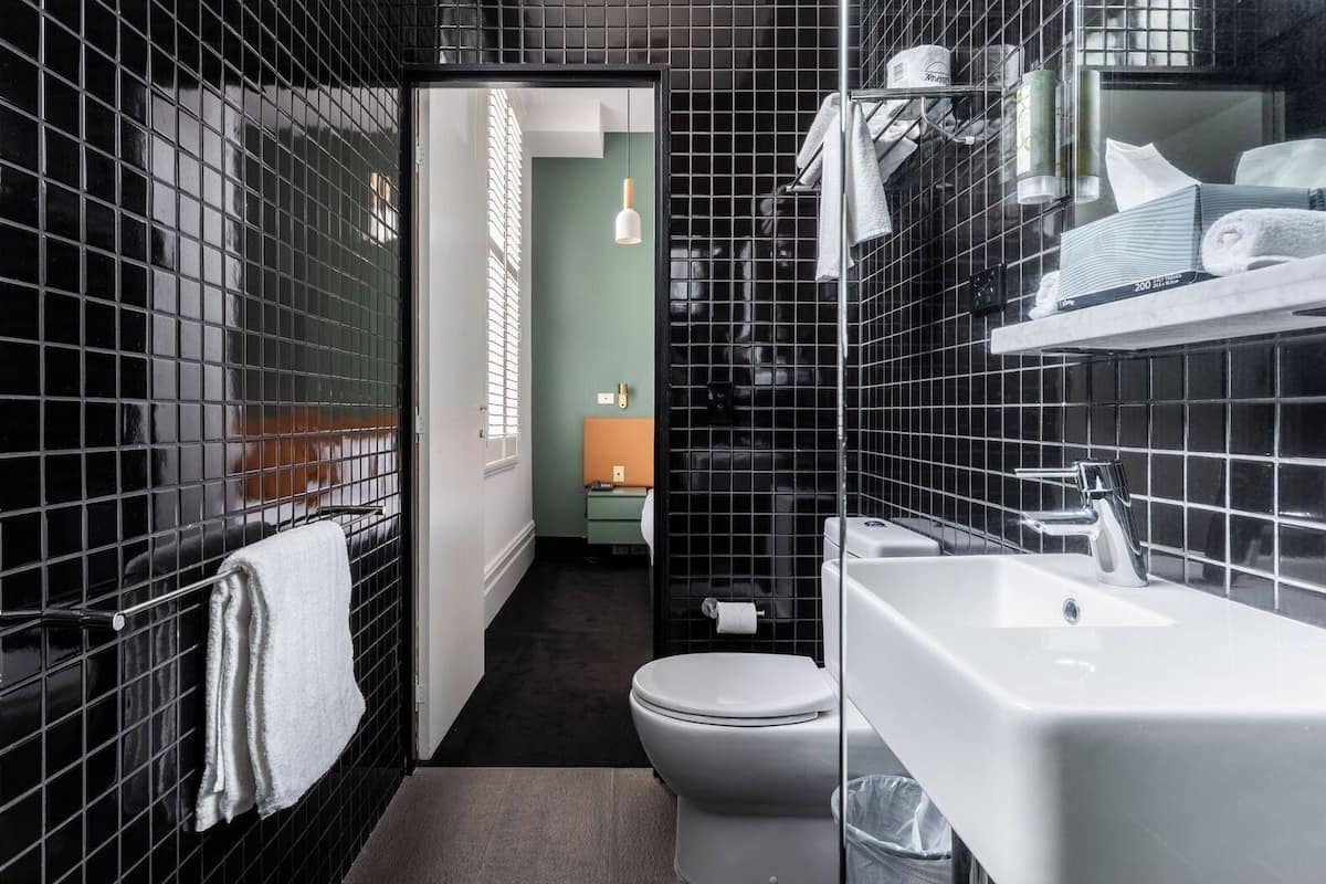 deluxe double room | bathroom | designer toiletries, hair dryer, towels