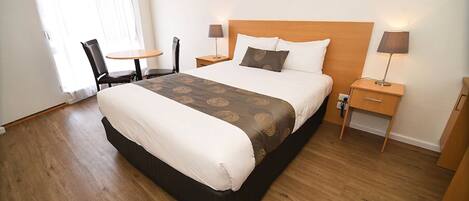 Desk, blackout curtains, iron/ironing board, rollaway beds