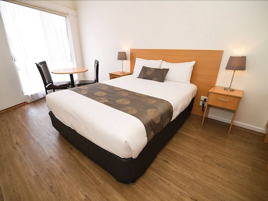 Desk, blackout drapes, iron/ironing board, rollaway beds