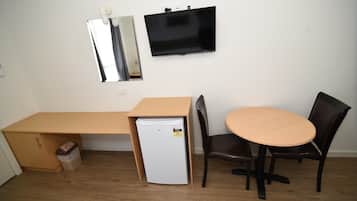 Desk, blackout drapes, iron/ironing board, rollaway beds