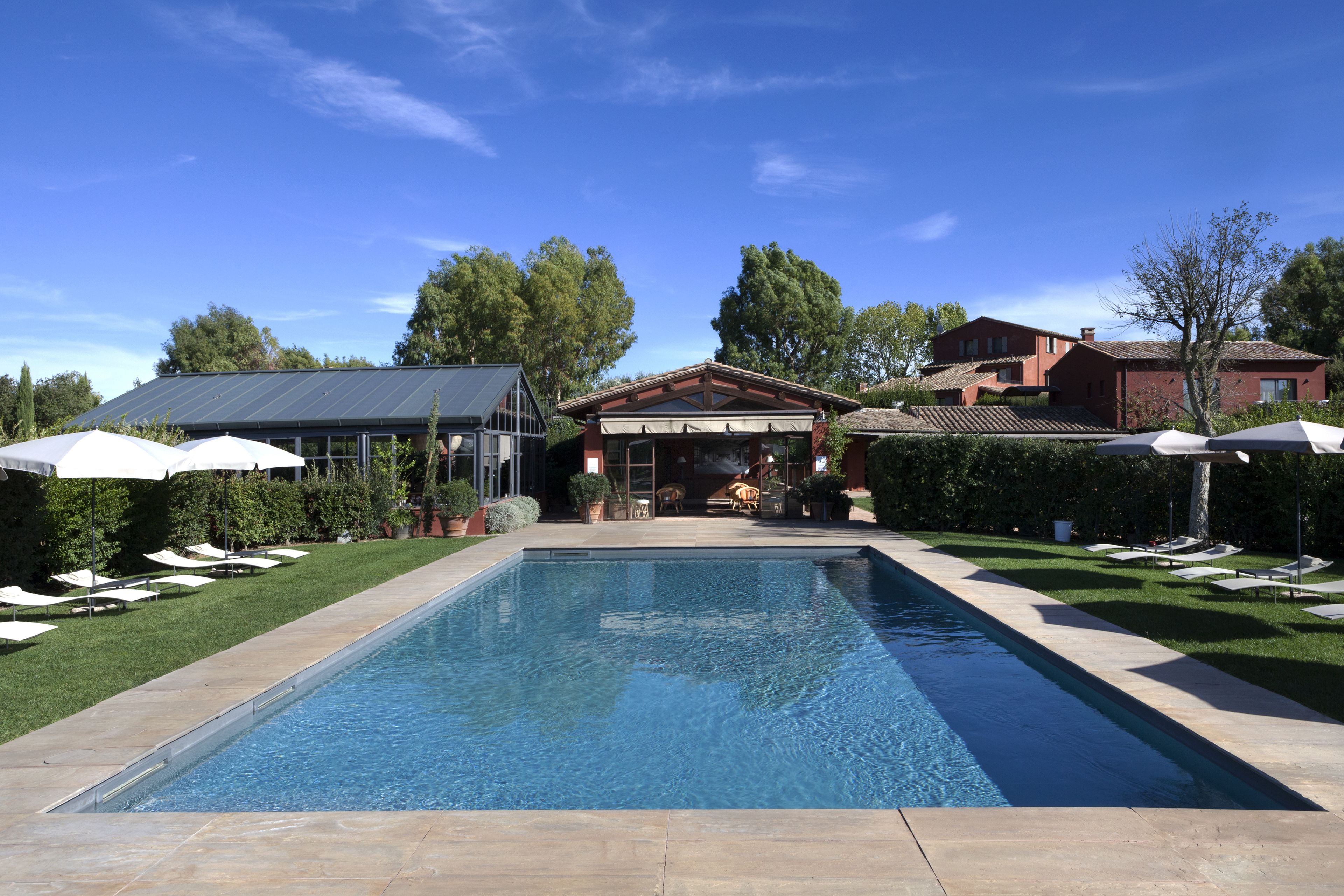 2 outdoor pools, pool umbrellas, pool loungers